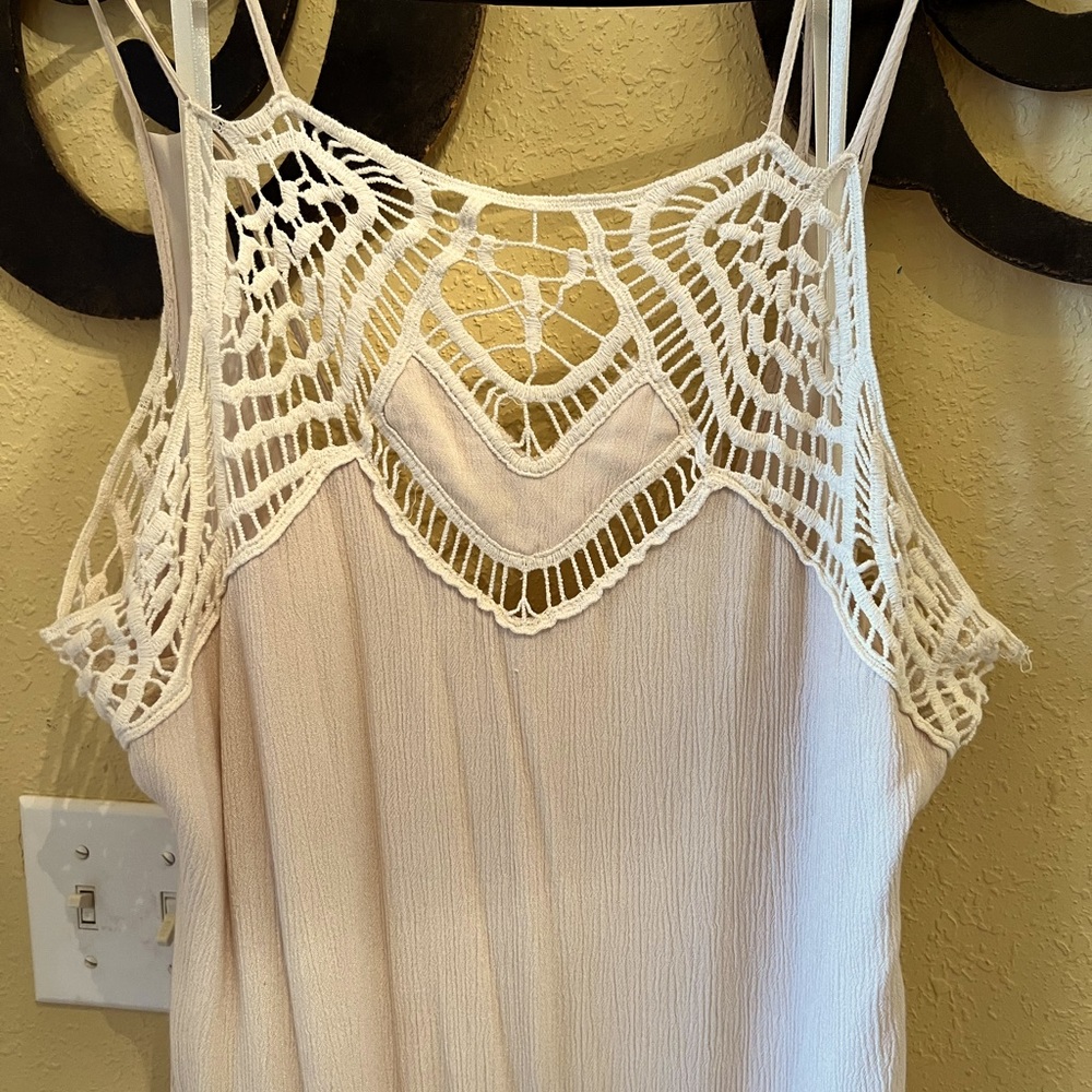 Beautiful bouquet bought dress. Worn once!   Cream in color with beautiful.